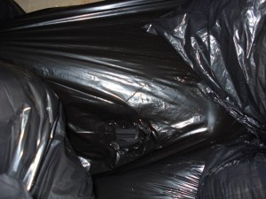 An air hole visible in a bagging / dumpster scene from 2010